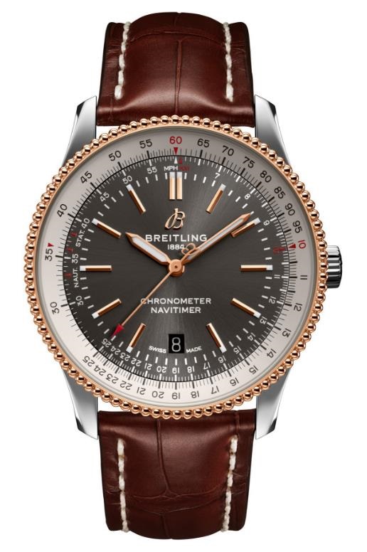 The smoky-grey dials fake watches have brown leather straps.