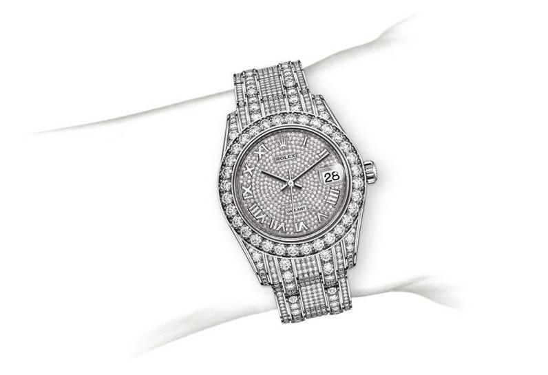 The 18ct white gold copy watches are paved with diamonds.